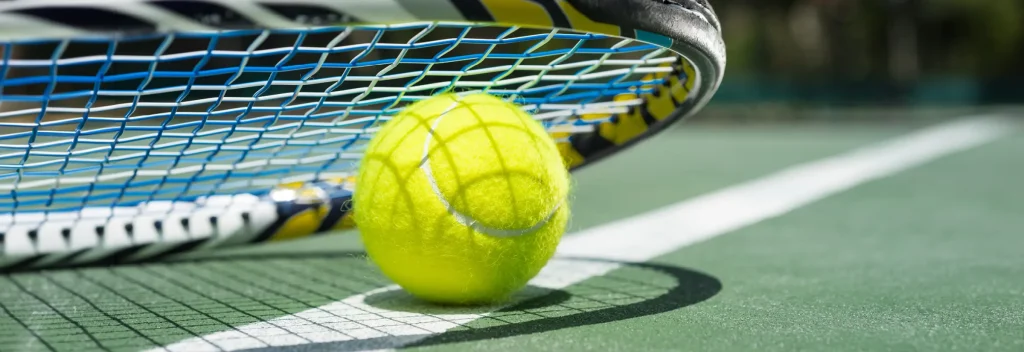 racket with tennis ball